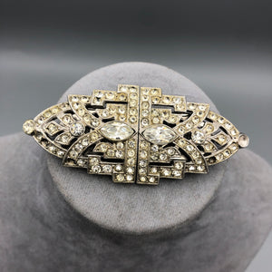 Convertible brooch with dress clips before restoration