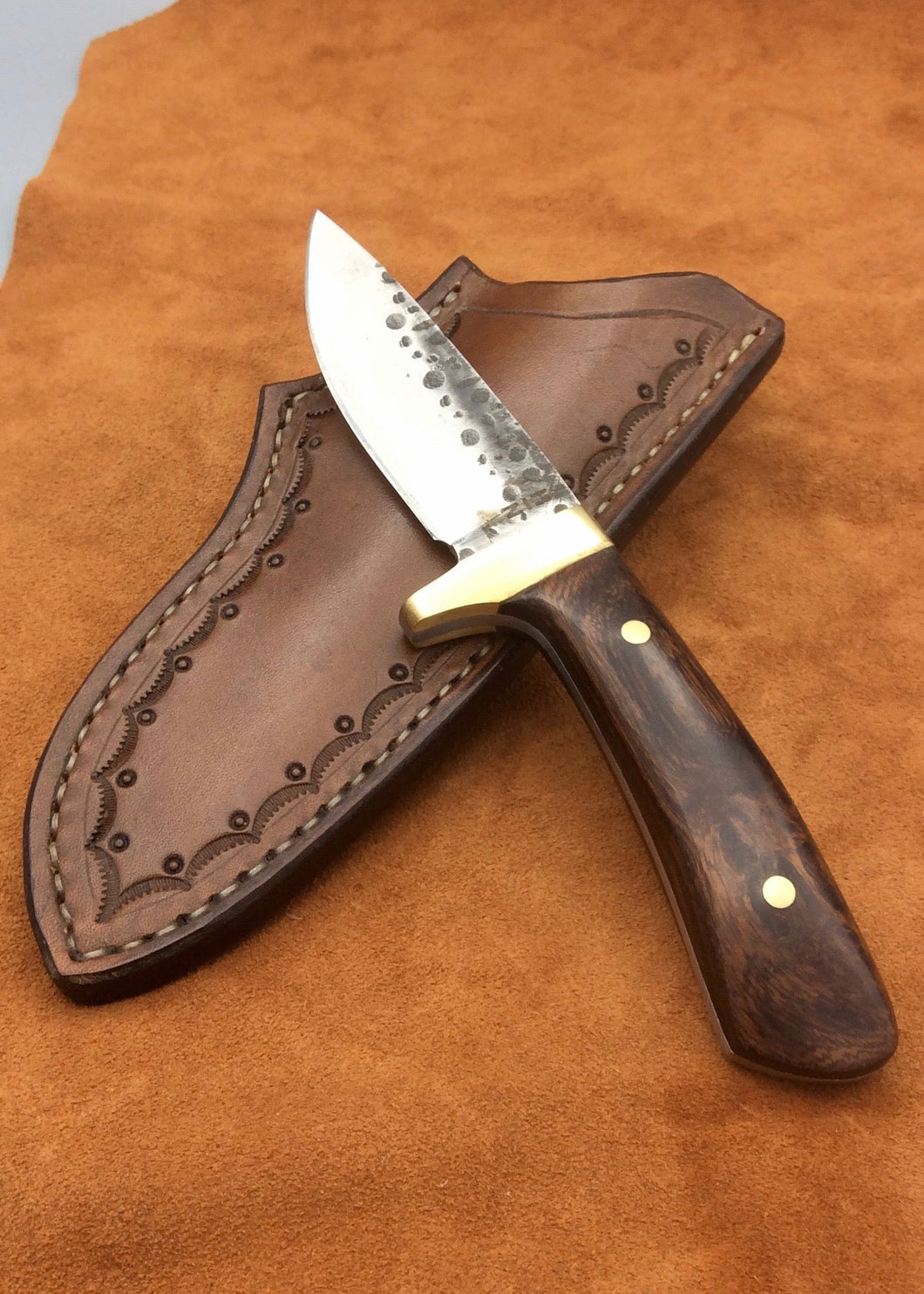 https://hbarncraftworks.com/cdn/shop/products/Montana-Vigilante-Hammered-Hunting-Knife-with-Arizona-Ironwood-Handles-and-Handcrafted-Leather-Sheath-H-bar-N-Craftworks_530x@2x.jpg?v=1687898564